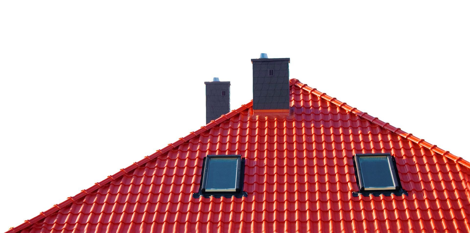 A red tiled roof with two chimneys and two skylights