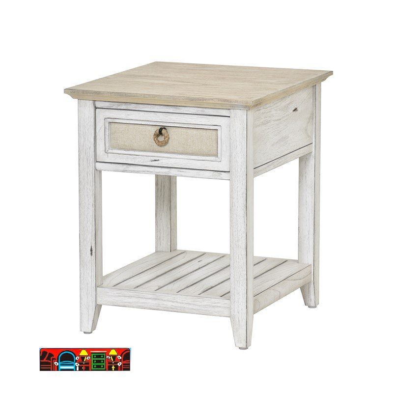Captiva Island end table in a coastal style, featuring a distressed white and beach sand finish, one drawer with an outdoor fabric front, a woven knob, and a bottom shelf.