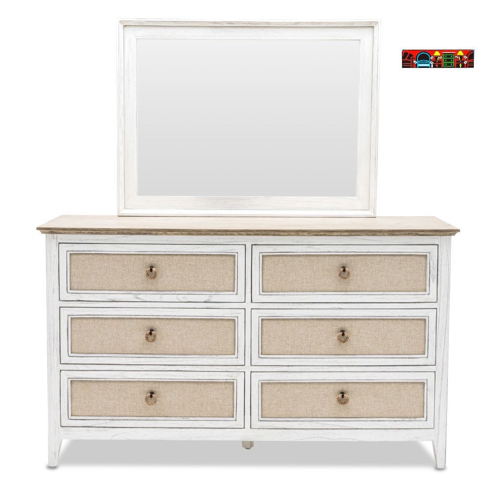 The Captiva Island dresser features a coastal design with a distressed white and beach sand finish, six drawers adorned with outdoor fabric fronts, woven knobs, and comes with a mirror.