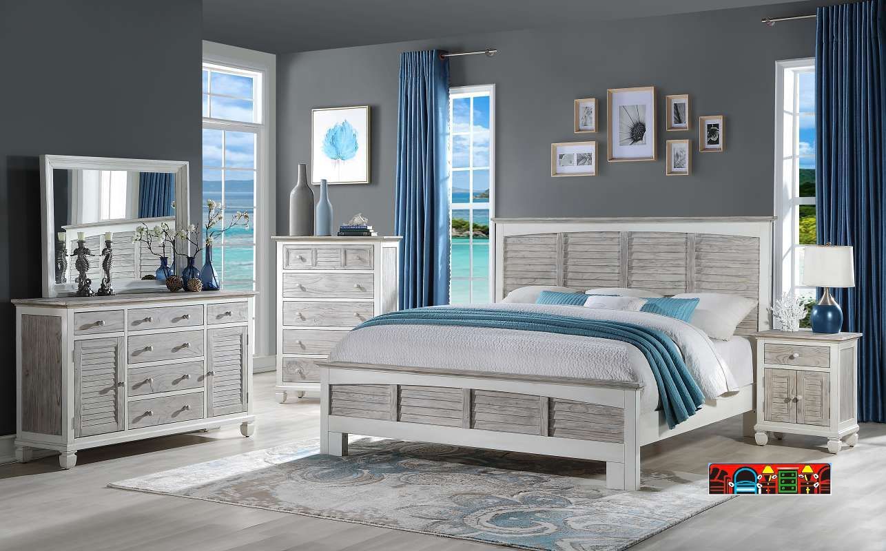 The Islamorada Bedroom Set features a coastal design in white and distressed grey, crafted from solid wood. 