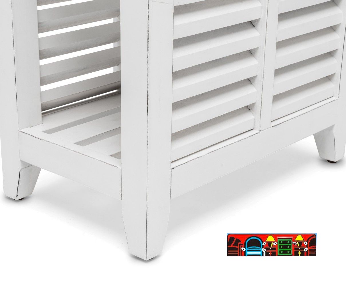 Islamorada Chairside table in white and distressed grey, featuring shutter accents, equipped with a drawer and a bottom shelf. Showcasing the shutter accents.