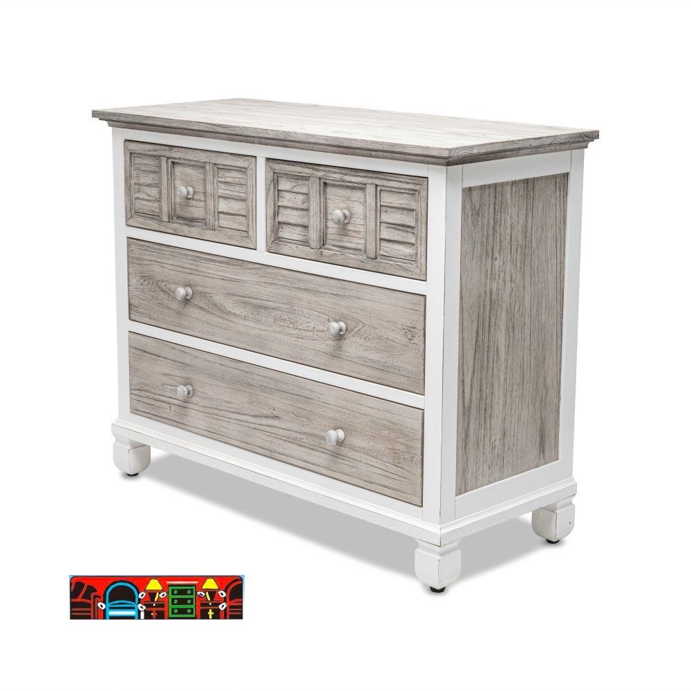 The Islamorada bedroom chest features a coastal design, crafted from wood with four drawers, finished in white and distressed grey, and detailed with shutter accents.