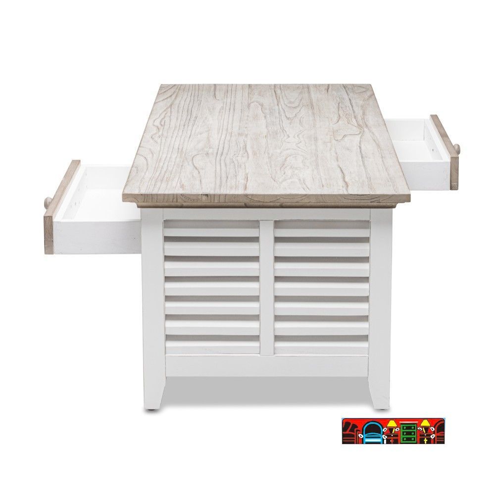 Islamorada Cocktail table in white and distressed grey, featuring shutter accents, equipped with two drawers and a bottom shelf. Showcasing flow-through drawers