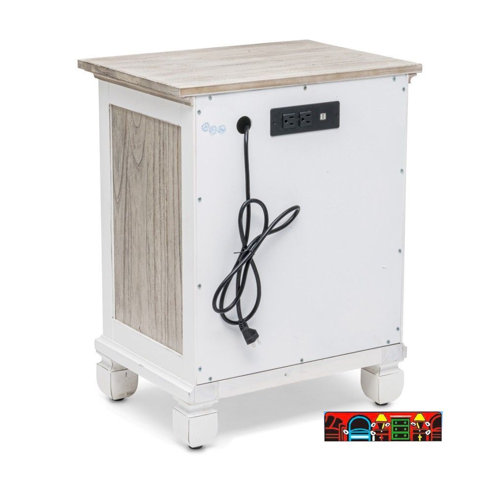 The Islamorada nightstand features a coastal design, crafted from wood with one drawer and two doors. It comes in white and distressed grey with shutter accents and includes a power supply.