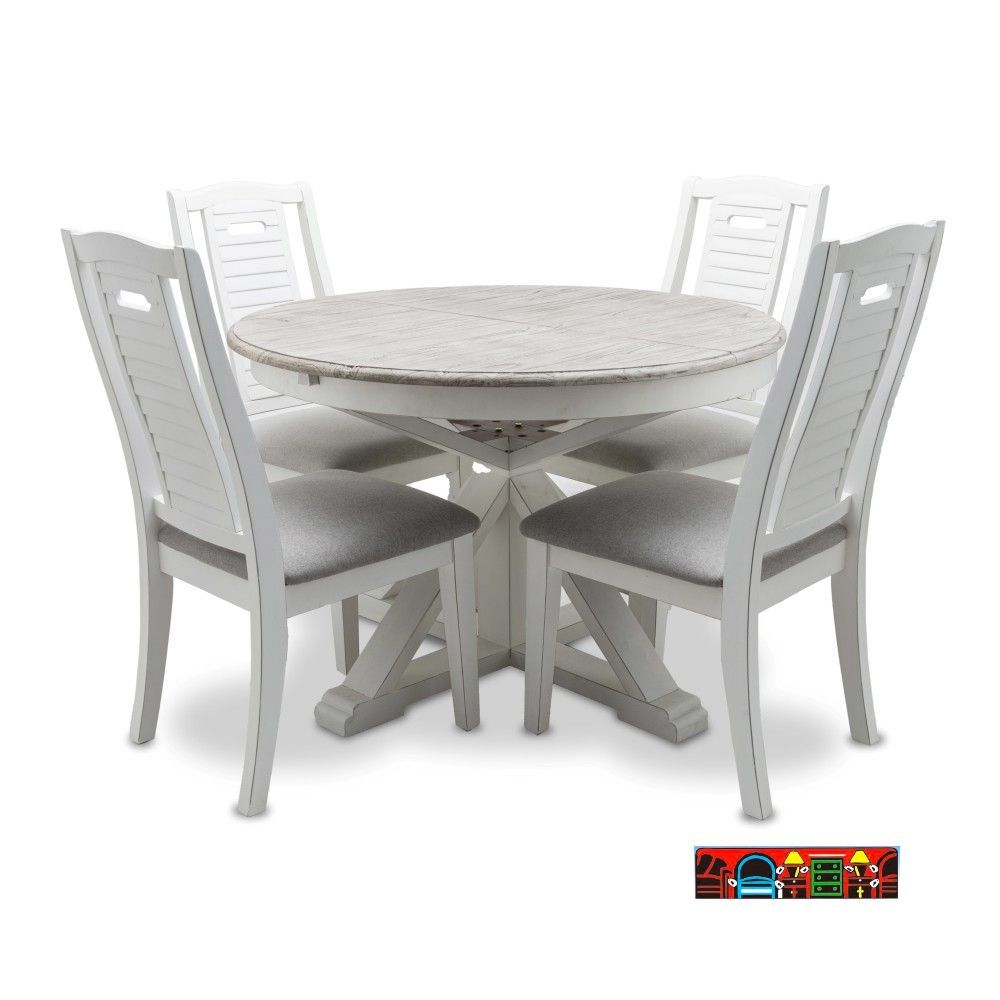 The Islamorada Dining set, featuring a weathered white finish with a distressed grey top, includes a round table with a butterfly leaf and four shutter back side chairs with gray cushions, currently on sale at Bratz-CFW.