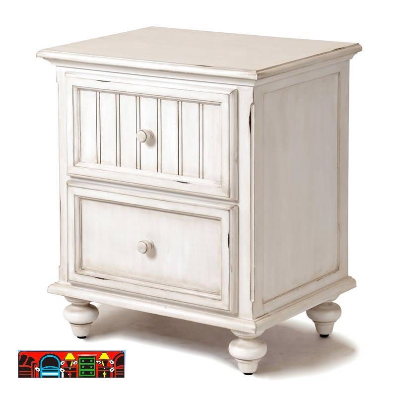 Nightstand in solid wood, featuring a distressed white finish, elegant turned feet, and two drawers for storage.