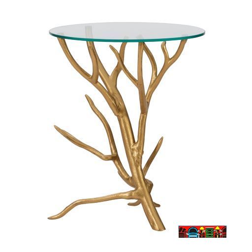 End table with a gold-painted aluminum branch design and a glass top.