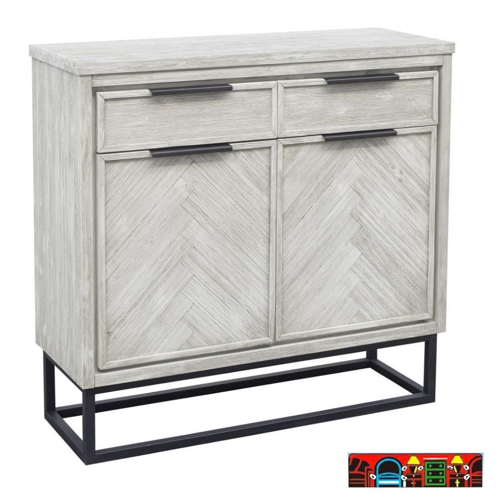 The Oak Brook Cabinet boasts meticulous handcraftsmanship, showcasing a planked herringbone motif across its dual door fronts. The wooden planks bear a distressed look and are coated in a nuanced off-white hue, enhancing the design's depth. The cabinet offers ample storage, with two upper drawers and a pair of doors beneath, revealing a spacious shelf. Magnetic closures on the doors guarantee a firm seal, while its open metal base adds a contrasting touch to the wooden structure.