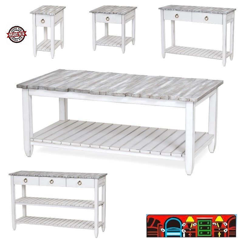 The Picket Fence Occasional Tables offer a coastal charm with its solid wood construction, distressed white finish, weathered grey tops, and rope pulls. Available at Bratz-CFW.