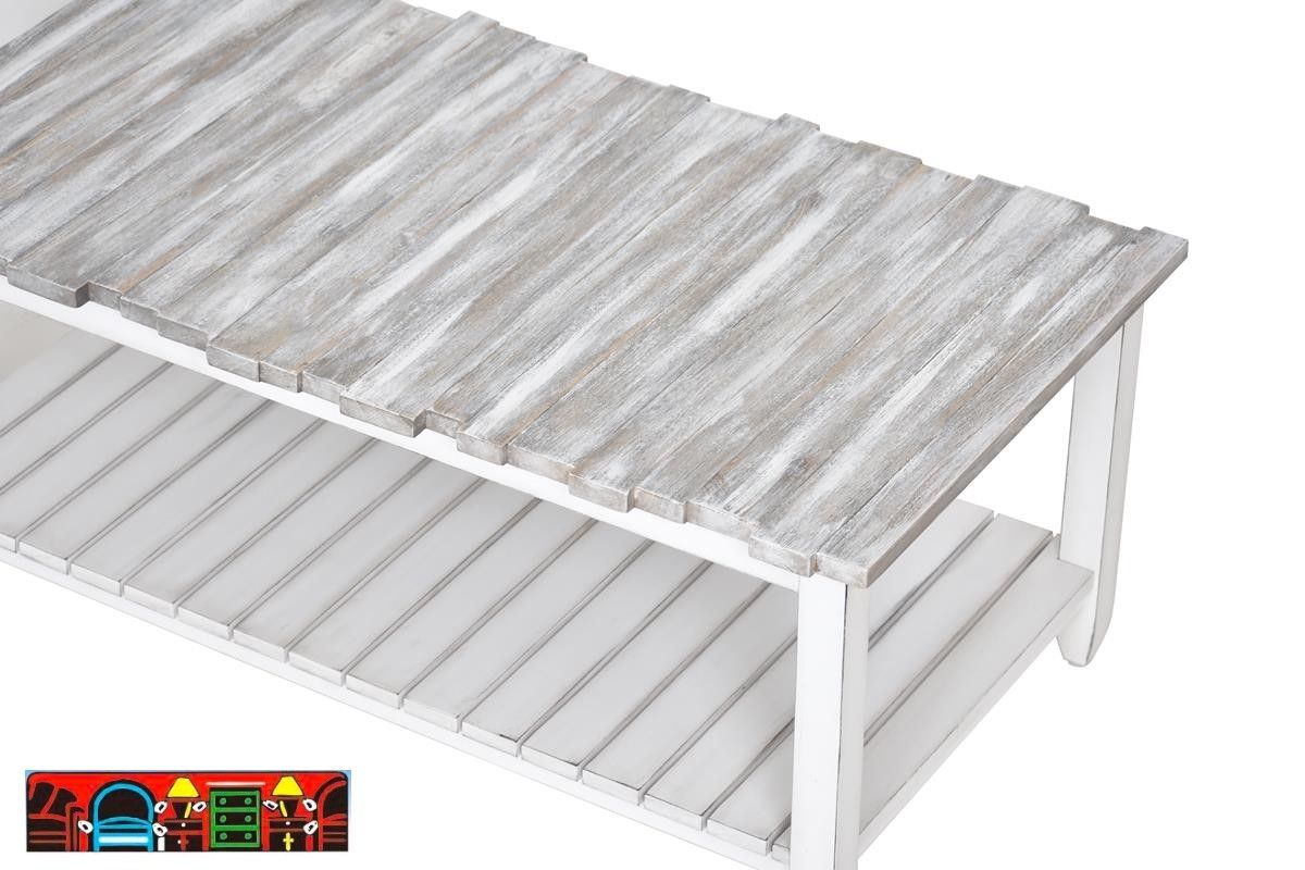 The Picket Fence Coffee Table offers a coastal charm with its solid wood construction, distressed white finish and weathered grey top. Available at Bratz-CFW.