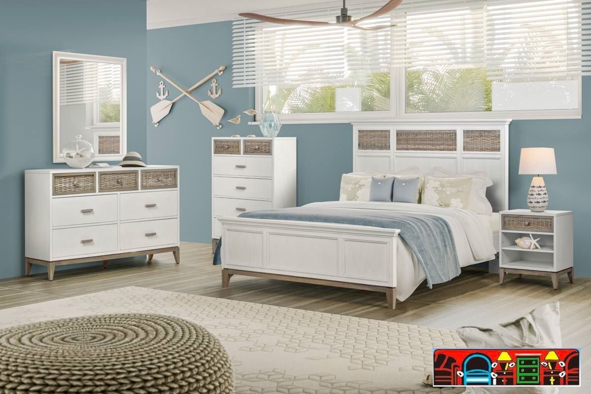 The Kauai bedroom set features a coastal design with a white, weathered wash finish and wicker accents on drawer handles and bases.