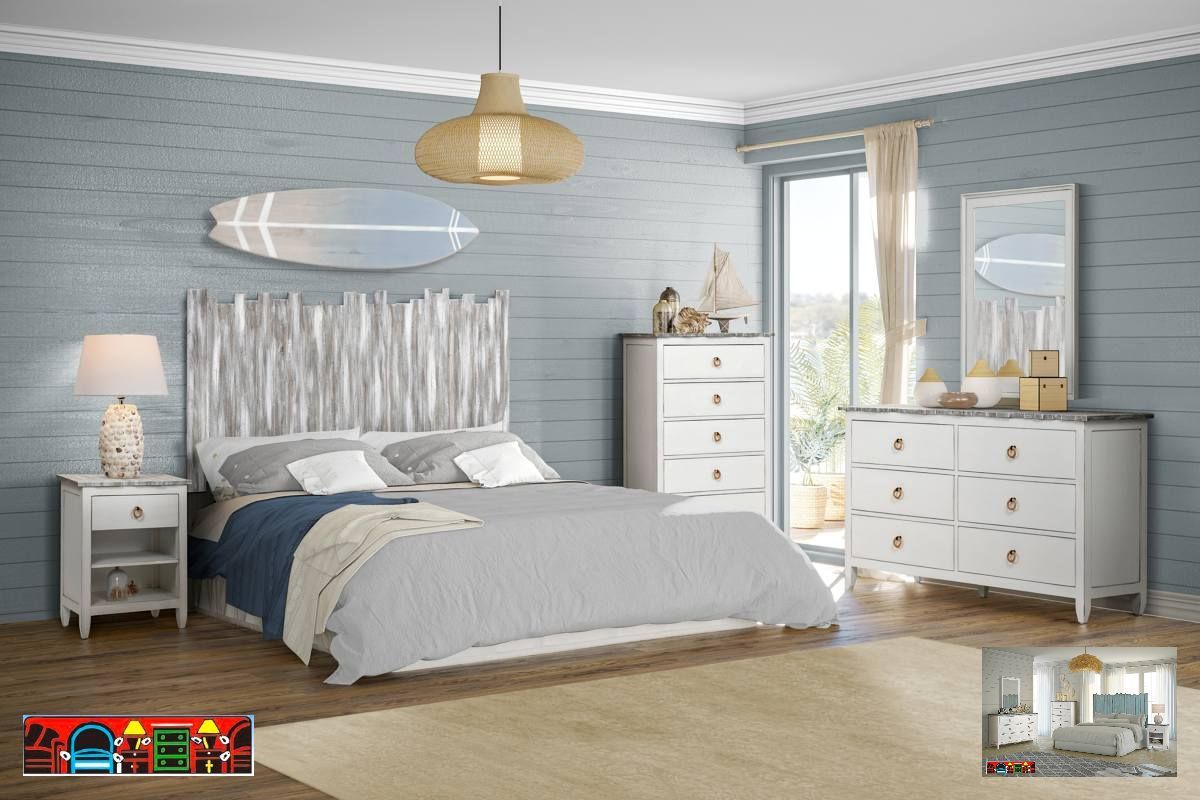 The Picket Fence Bedroom Set offers a coastal charm with its solid wood construction, distressed white finish, weathered grey tops, and rope pulls.
