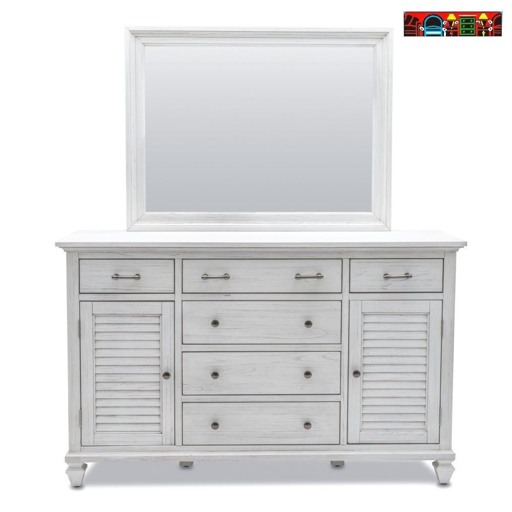 The Surfside Dresser and mirror, featuring weathered white wood with louver accents, is available for sale in Fort Myers, FL, at Bratz-CFW.