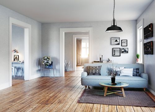 Contemporary living room furniture set in a modern home interior with neutral tones.