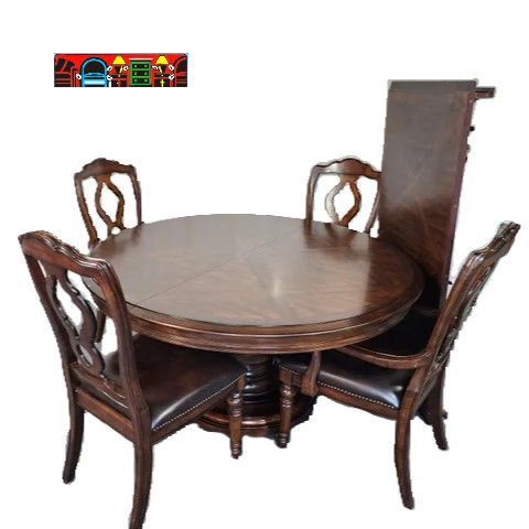 Bernhardt solid wood round pedestal leaf table with 2 side chairs and 2 armchairs.