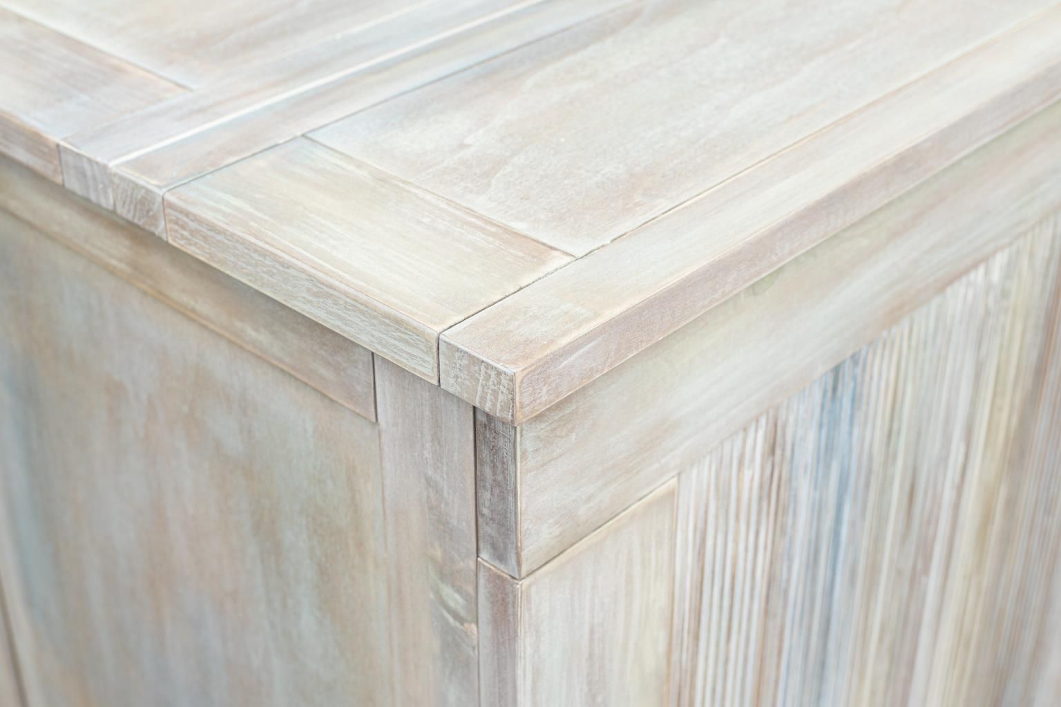 Multi-color cabinet bed with drawer on the bottom. Close-up of the finish.