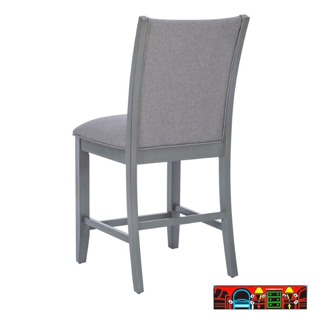 Bellevue 5-piece counter-height dining set in grey, featuring a glass top, upholstered cushions and backs, available at Bratz-CFW in Fort Myers, FL. Chair back.