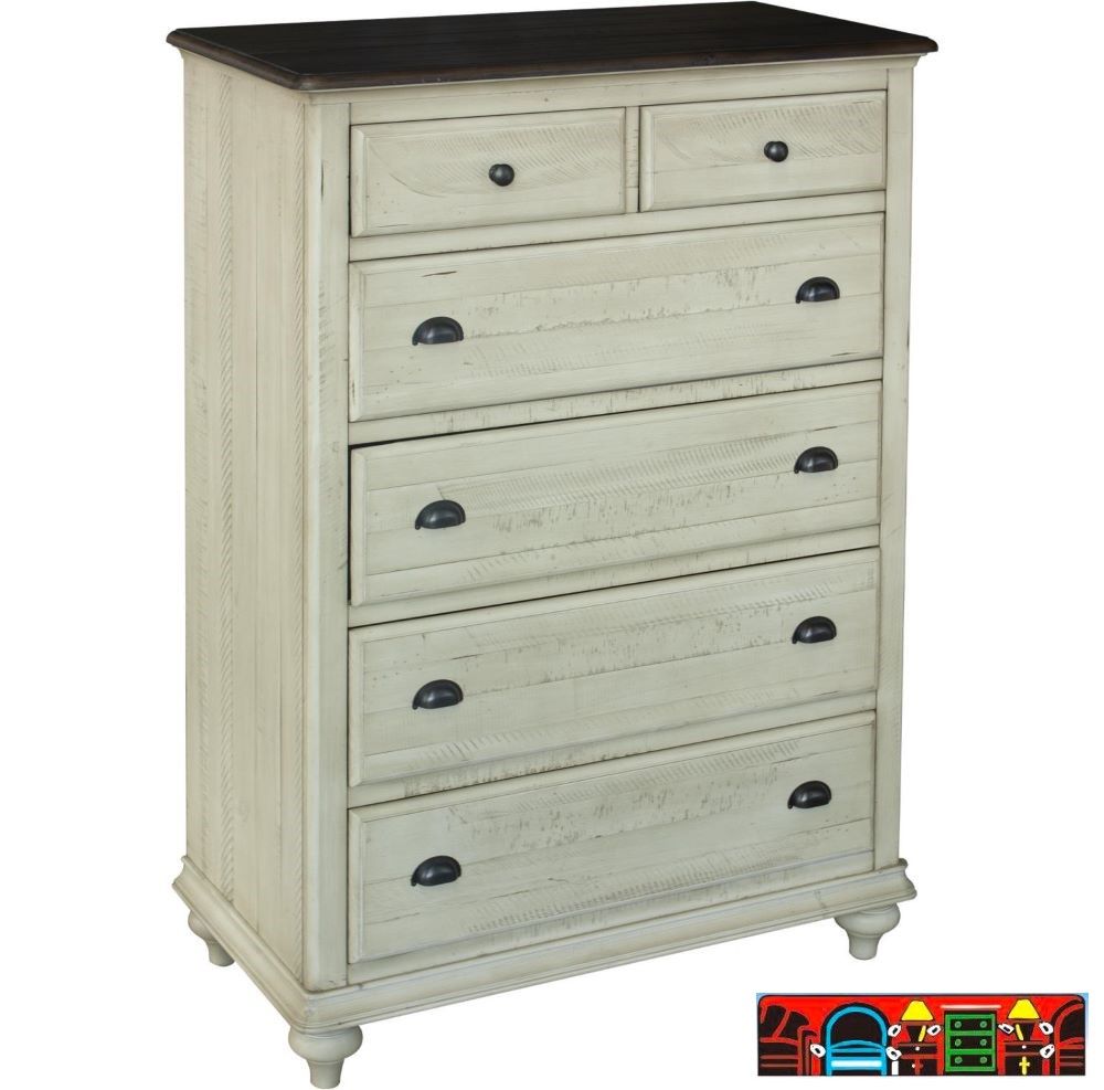 Brockton 5-Drawer Chest, crafted from solid wood, features a wheat color with a dark brown top, both exhibiting a distressed finish. It includes louver accents and contrasting metal handles.