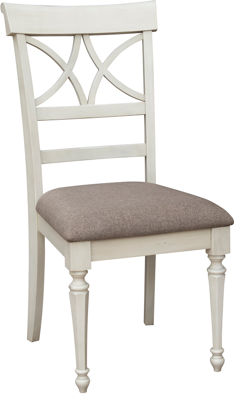 The Brockton Dining Chair features a solid wood frame, finished in wheat color with a distressed look. It includes upholstered seat cushions.