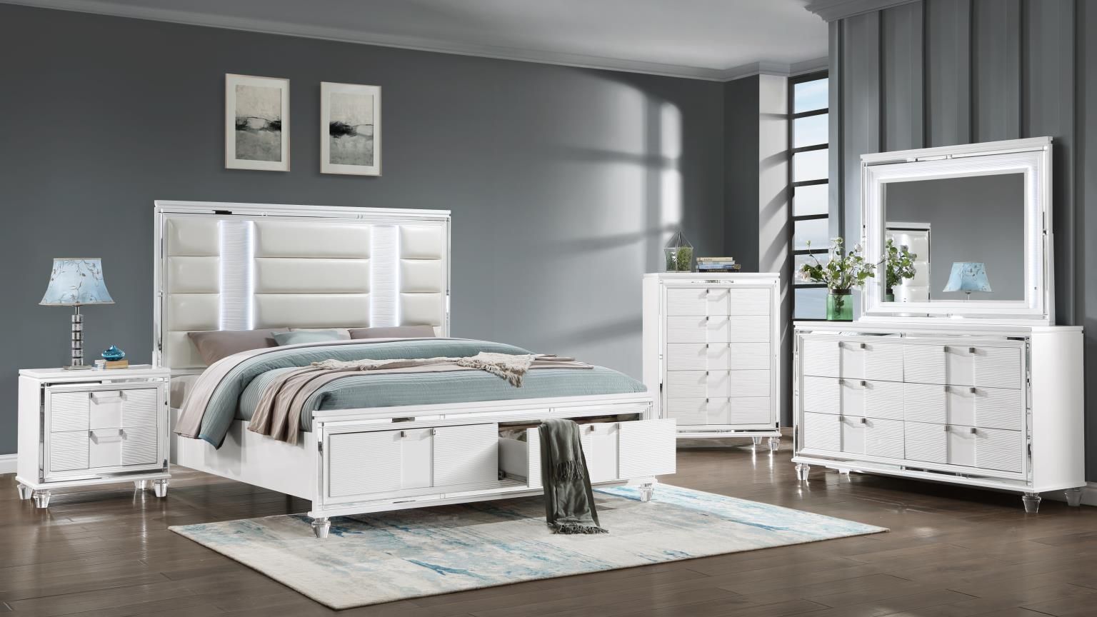 white bedroom set with a 2-drawer-nightstand-queen-bed-with-led-lighting-and-2-drawer-footboard-5-drawer-chest-and-six-drawer-dresser-with-mirror