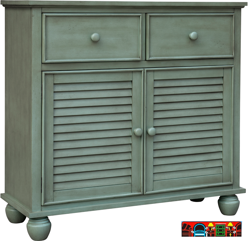 The Nantucket Cabinet, crafted from wood and finished in antique fern green. Features Two drawers, two doors, and a shelf. It is available at Bratz-CFW in Fort Myers, FL.