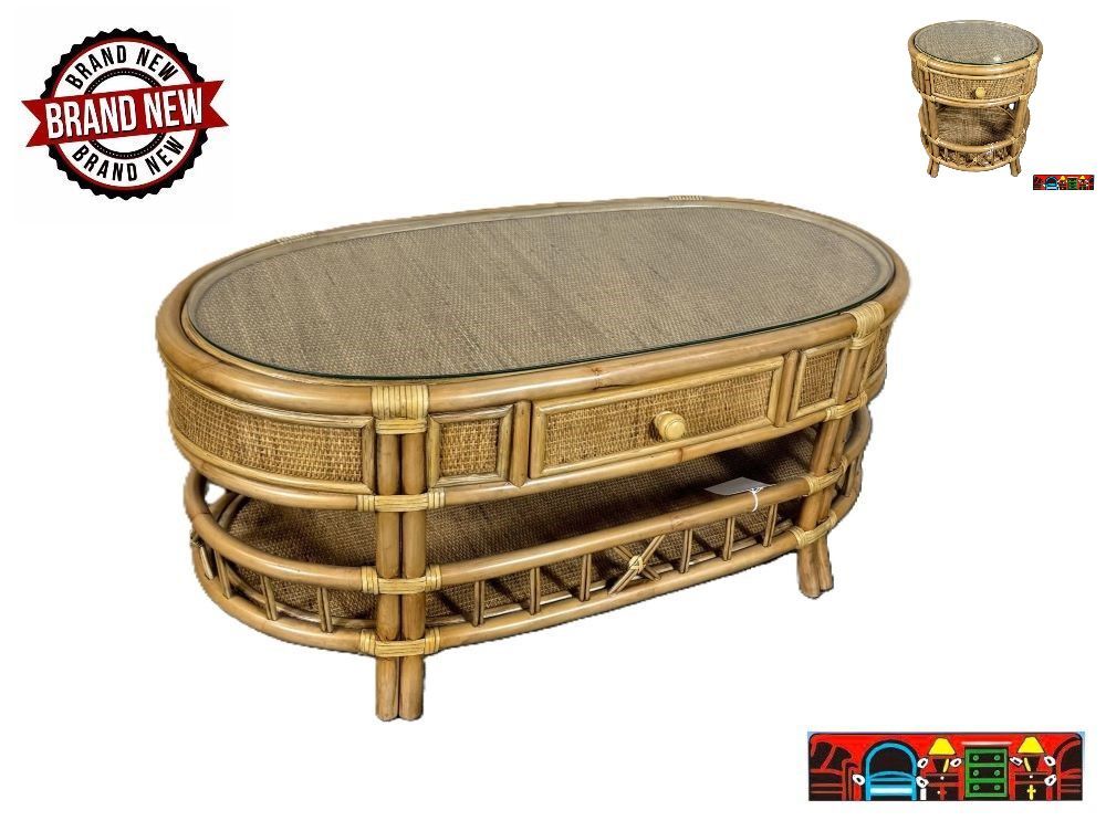 ​ Oval coffee table featuring a rattan frame with leather-wrapped joints, wicker accents, and a honey finish. This table includes one drawer, a bottom shelf, and a glass top.  And a matching round end table.
