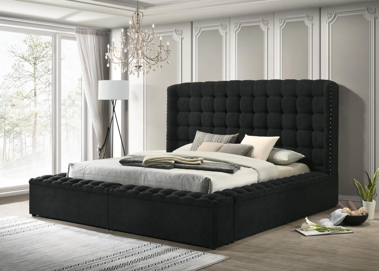 Black completely upholstered storage bed with high headboard, tufted surround and nail head accents.