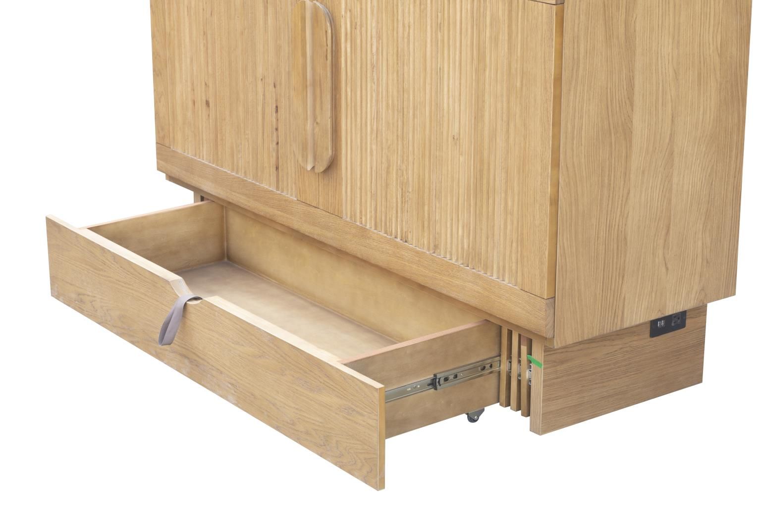 Oak finish cabinet bed with a decorative pencil wood design and 2 large wood handles. with a drawer at the bottom. Angled view with bottom drawer open.