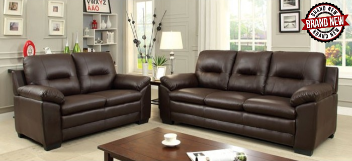 brand new chocolate-brown leather sofa featuring three cushions and cushioned arms