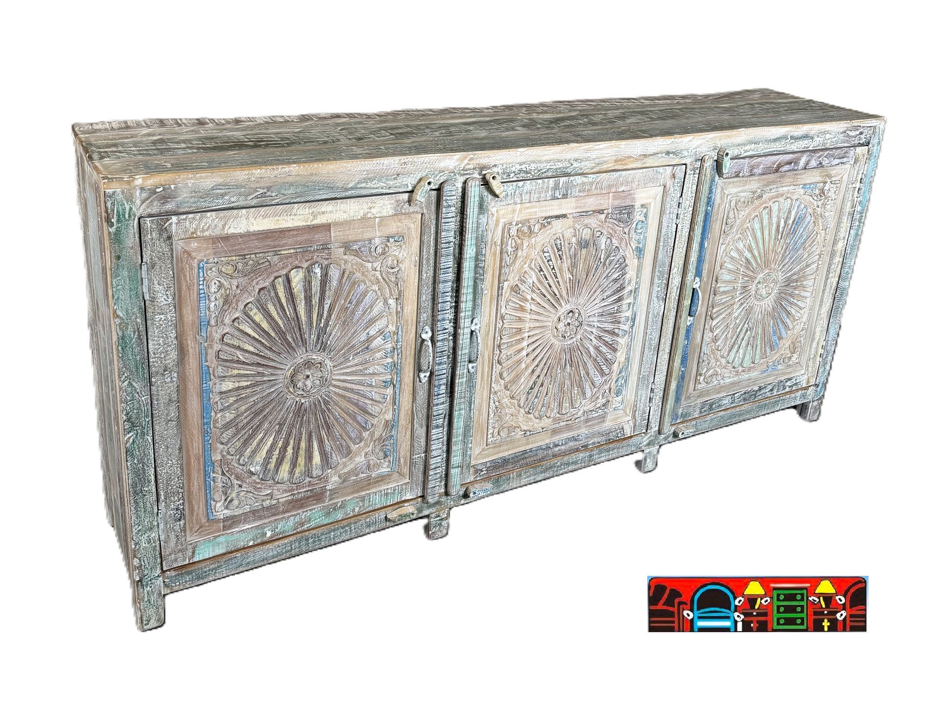 A coastal sideboard with three doors, made of solid reclaimed wood in multicolor. Each door has a starburst pattern engraved on the front and a shelf behind it.