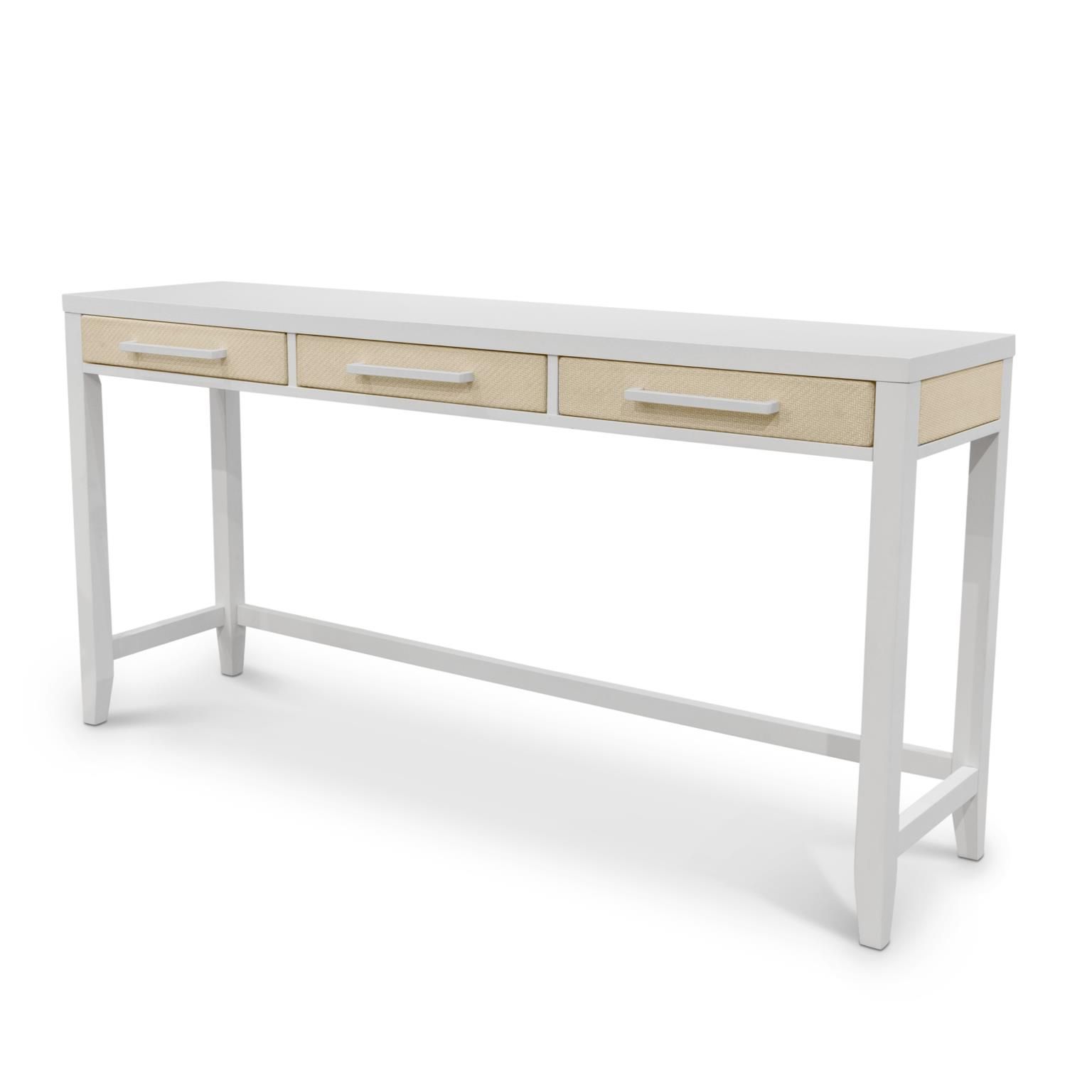  3-drawer console table. White wood with woven sand color accents and white metal handles.