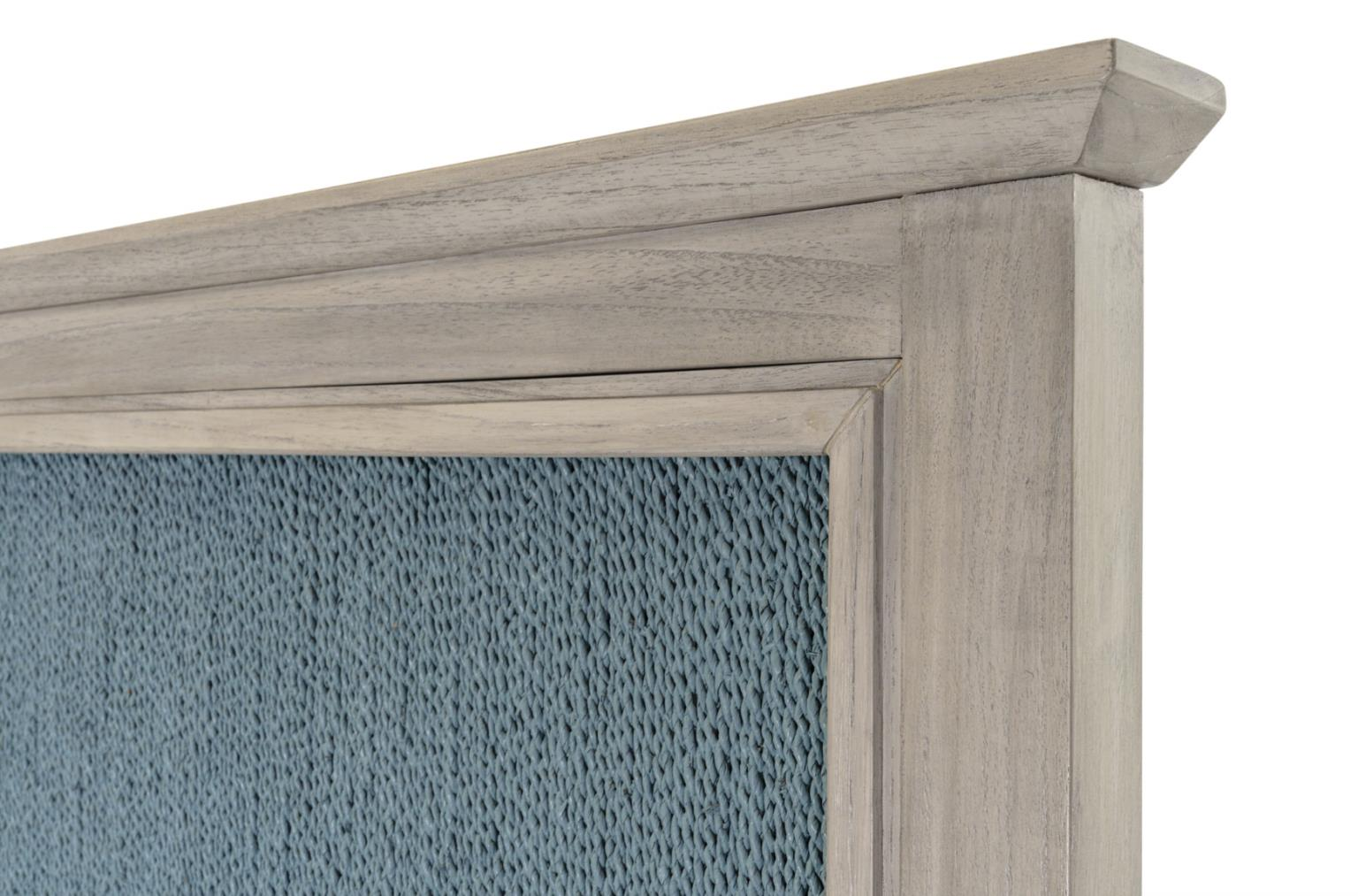 bedroom headboard, aged ivory color with ocean blue woven front panel, close-up of corner