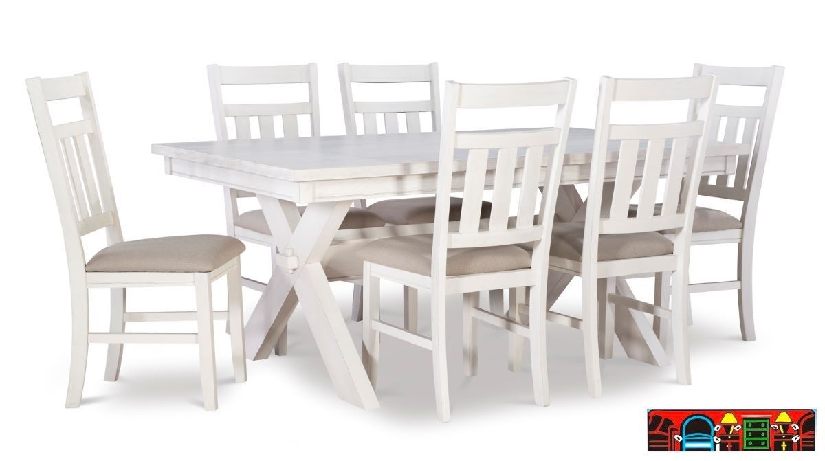 The Torino white farmhouse dining table, accompanied by six side chairs with beige cushions, for sale at Bratz-CFW, is available in Fort Myers, FL.