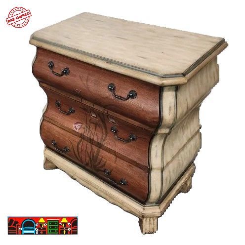 Bombay Cabinet: Crafted from wood with a distressed cream finish and brown drawer fronts, featuring hand-painted accents along the drawers. This piece is available at Bratz-CFW in Fort Myers, FL.