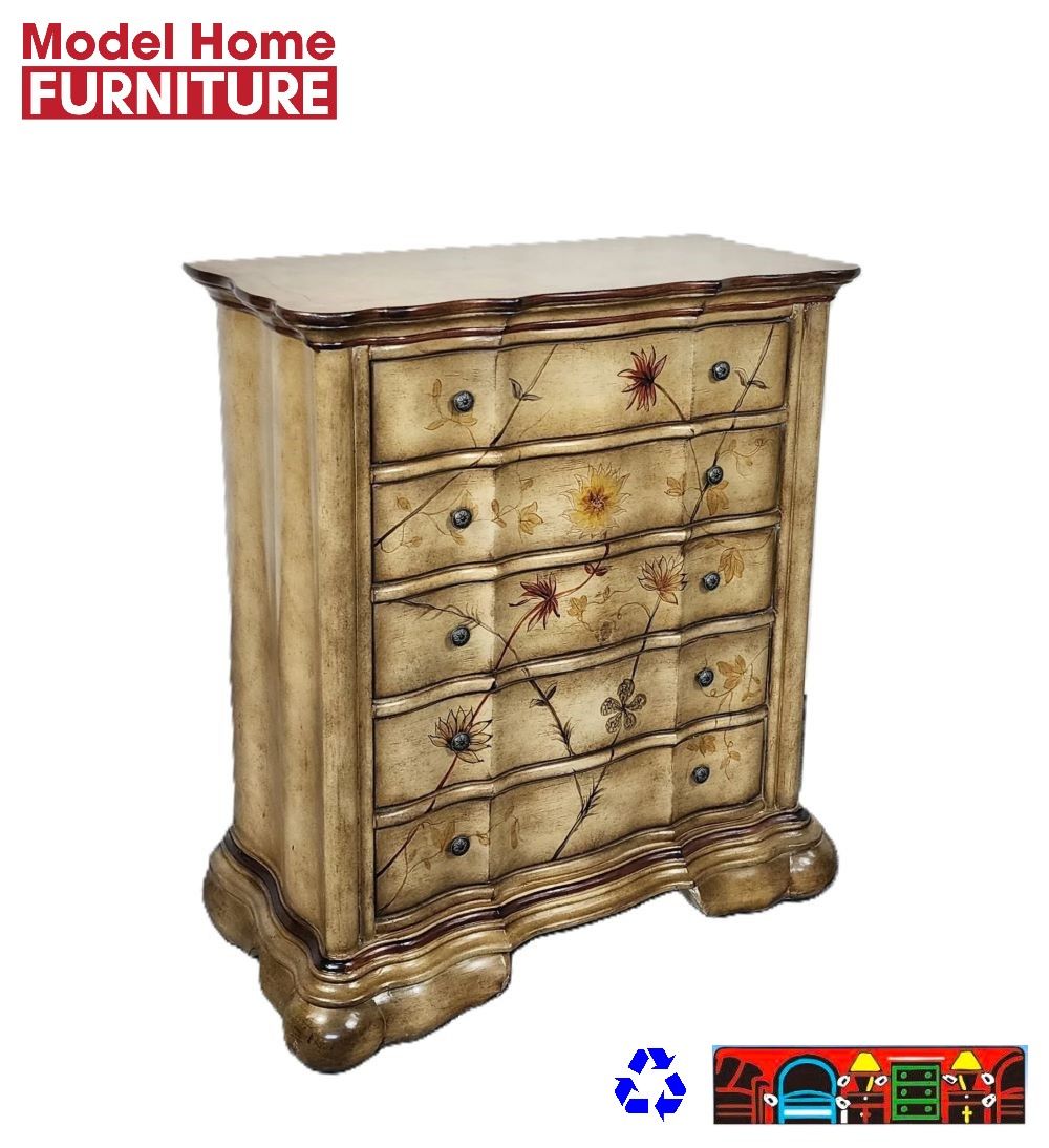 Discover a hand-painted accent chest with five drawers, featuring a cream finish, brown top, and floral design on the front, available at Bratz-CFW in Fort Myers, FL.