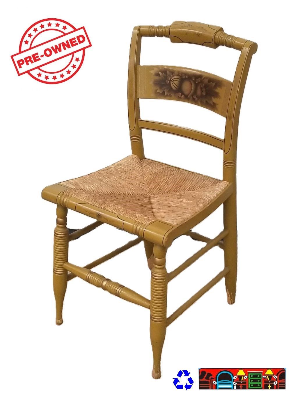 A vintage Hitchcock child's chair, featuring a wooden frame with a woven seat and hand-painted accents, is available at Bratz-CFW in Fort Myers, FL.