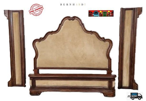Dark wood trim king bed with beige upholstery