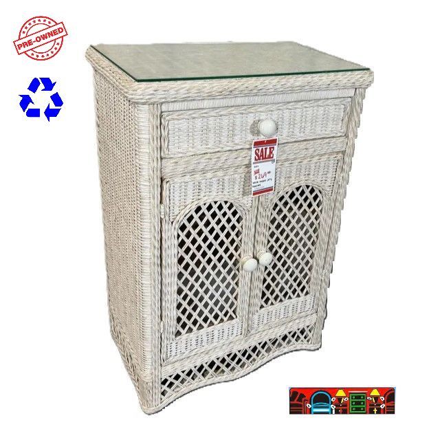 Wicker Jelly Cabinet with two doors, one drawer, a glass top, and a whitewash finish on a wooden frame is available at Bratz-CFW in Fort Myers, FL.