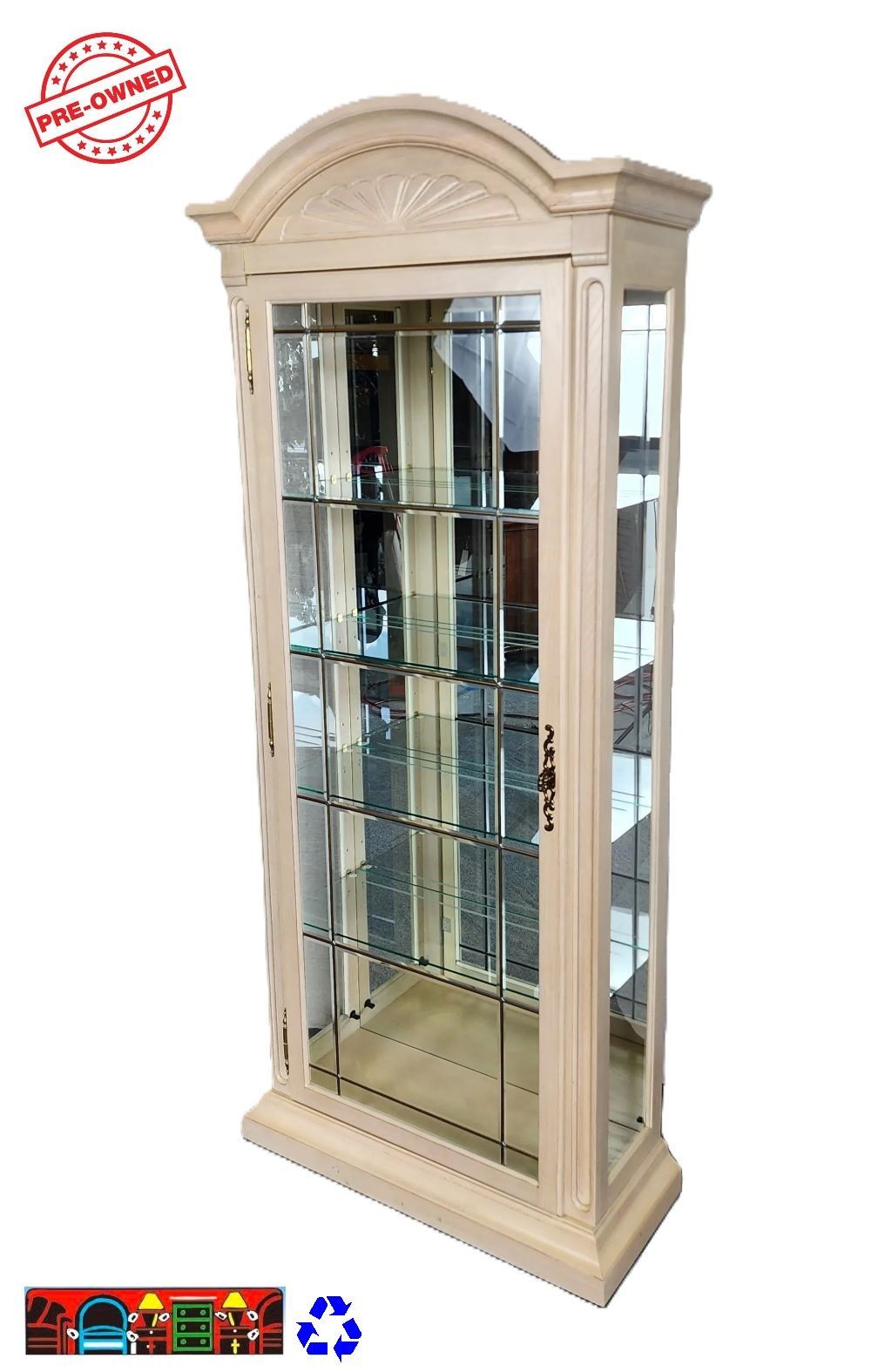 A whitewashed curio cabinet with an arched top and a carved front. It has four glass shelves with plate grooves and a light inside. The glass on the front door has an etched design.