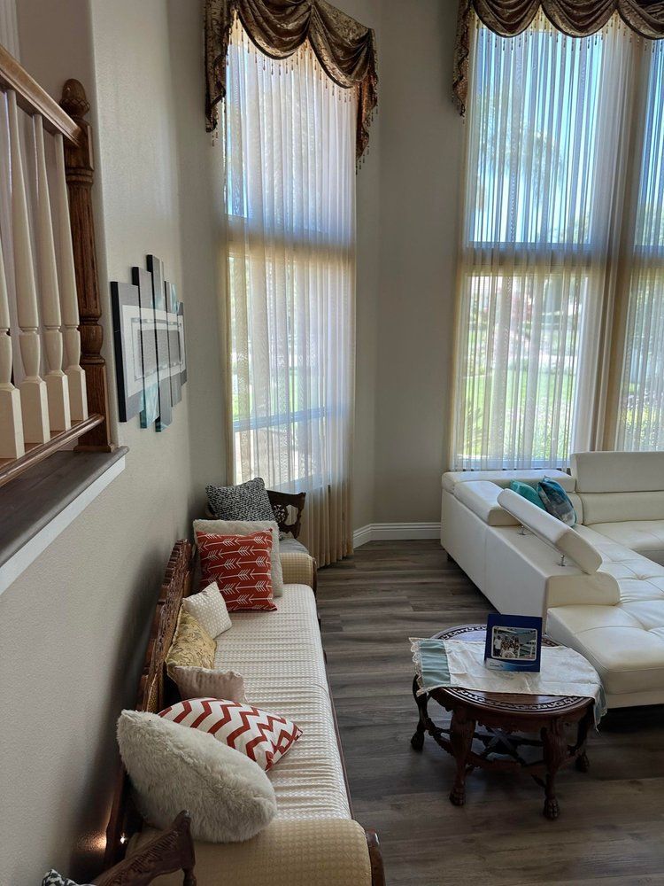 A living room with a couch and a table
