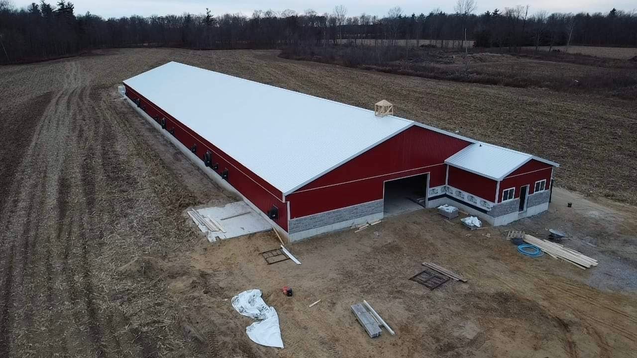 New large barn construction site completed. Excavator services used. Near Tillsonburg.