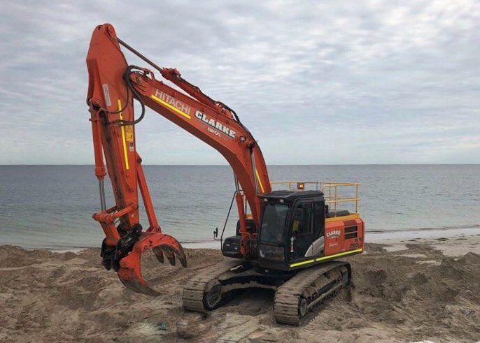 view of a crane working at a project site