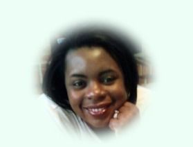 Woman with dark hair smiles, resting chin on hand. Soft focus, bright background.