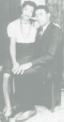 Two people in a black and white photo