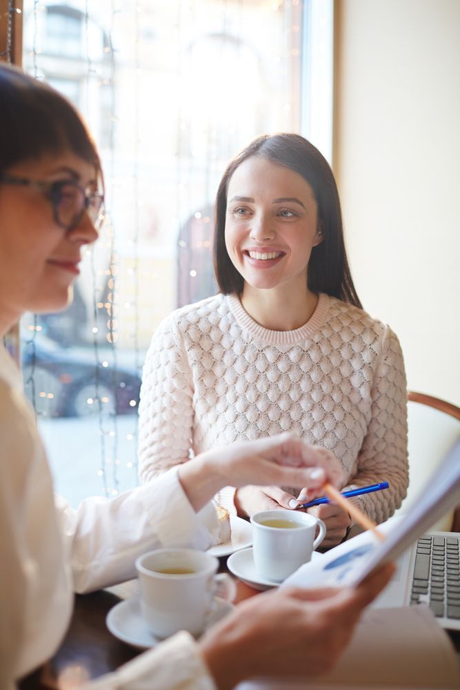 Young Ladies Meeting At Cafe — One Stop Bookkeeping in Chilcotts Grass, NSW