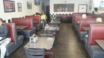 pizzeria customers sitting in booths