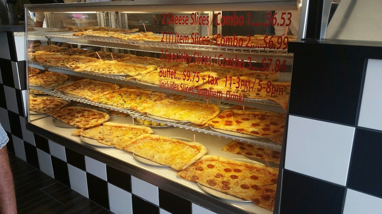 multiple types of New York style pizza on display in Greenville, NC pizza restaurant