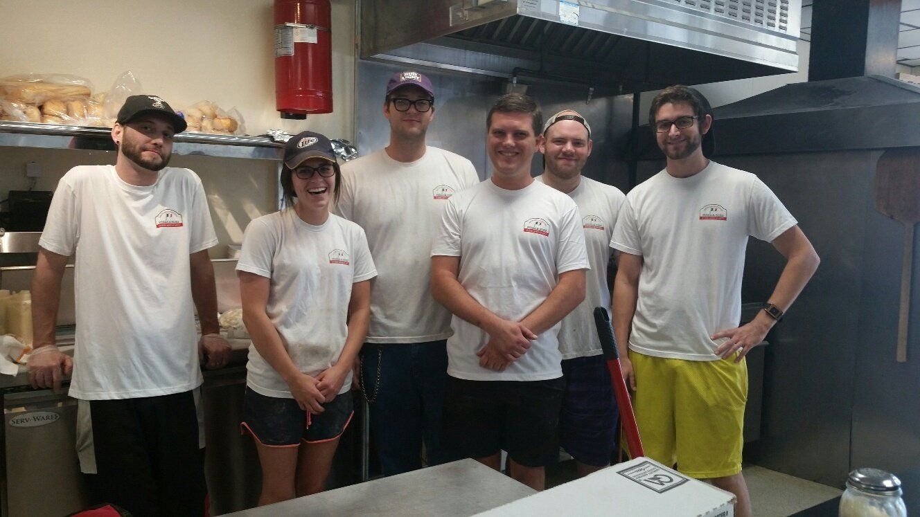 Pizza restaurant staff in Greenville, NC