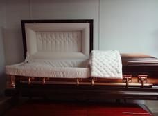 A black and white photo of a family with two children.