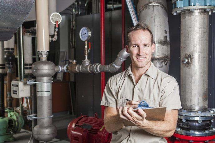 Man Checking the Compressed Air System — Arlington, WA — Compressed Air Systems